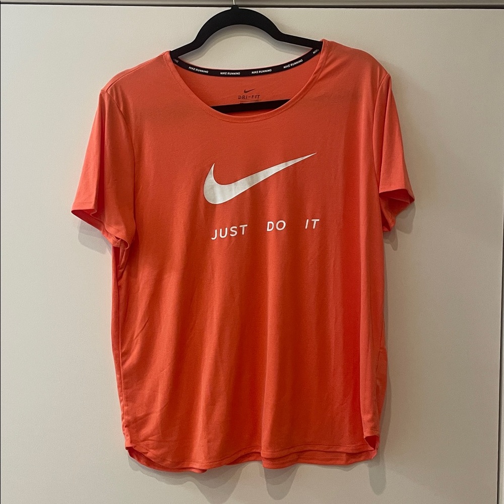 Nike Coral running Tee with Swoosh and Slogan